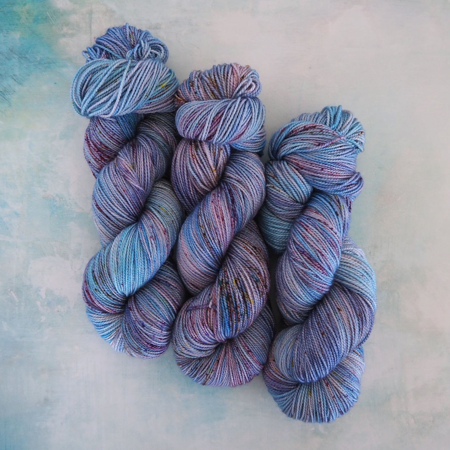 Silky Twist yarn (80% SW Merino/20% Silk, weight 1)